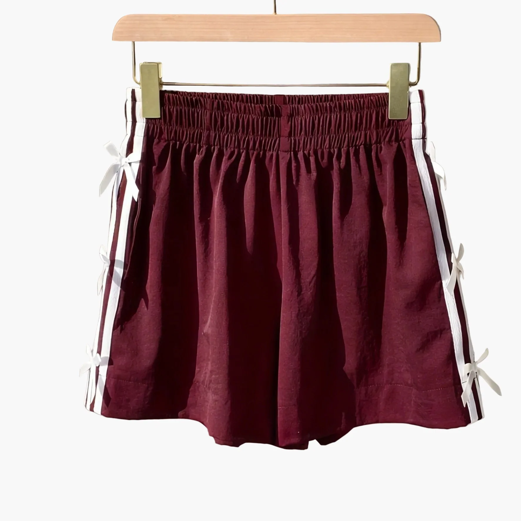Short décontracté femme style vacances avec nœuds latéraux et bandes sportives - Image 12
